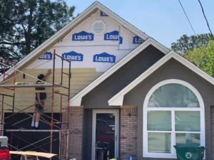 Martin installing hardie board